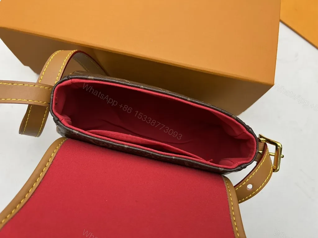 View 3 of Monogram Saddle Bag: Compact Crossbody, All-Day Style