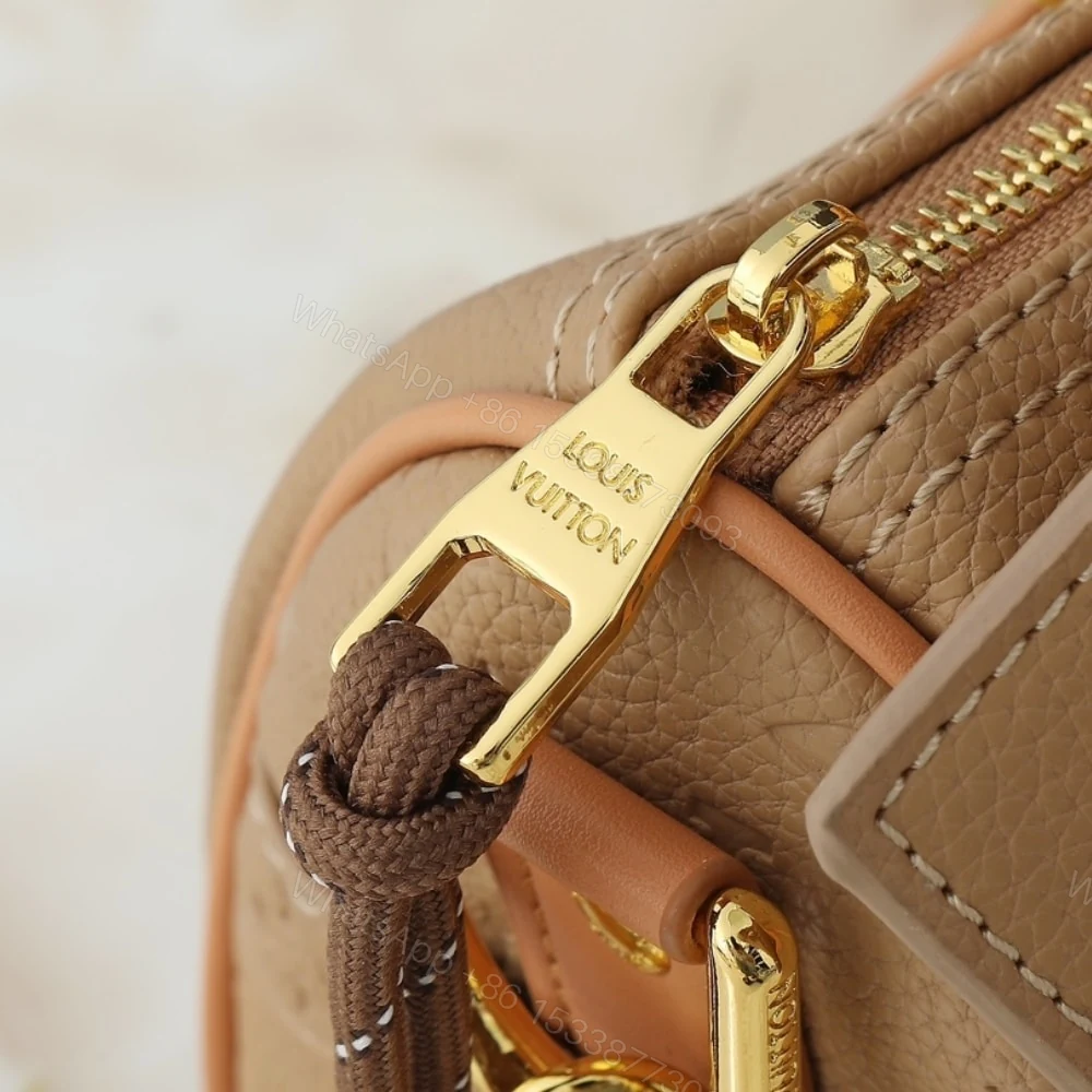 View 6 of Louis Vuitton Keepall Bandoulière 25 Bag Beige 25Cm M12627