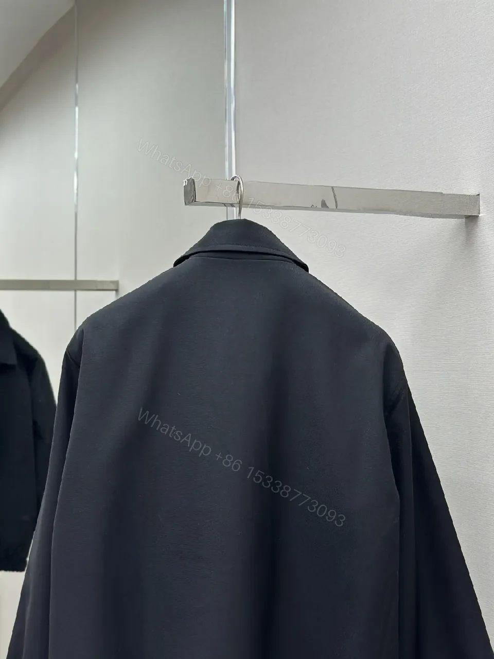 View 7 of Minimalist Black Coach Jacket: Premium, Wind-Resistant Utility Jacket