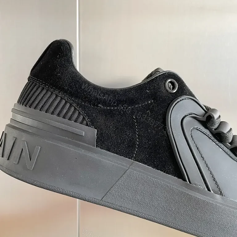View 9 of Monochrome Mastery: Black Leather Balmain Sneaker, Luxury Casual