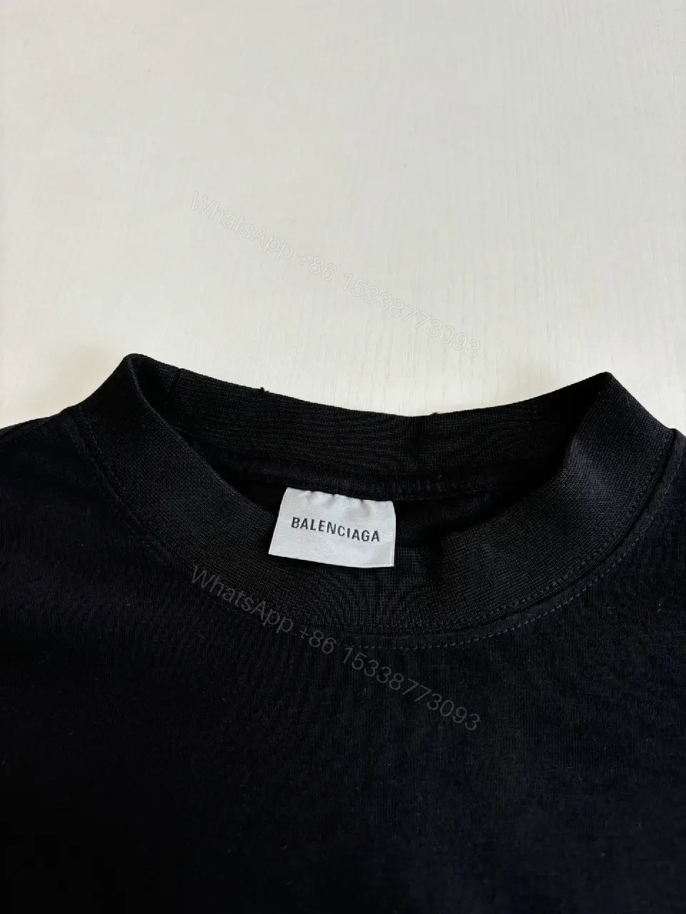 View 9 of Black Cotton Blend Tee - Bold Graphic, Luxury Streetwear, Relaxed Fit
