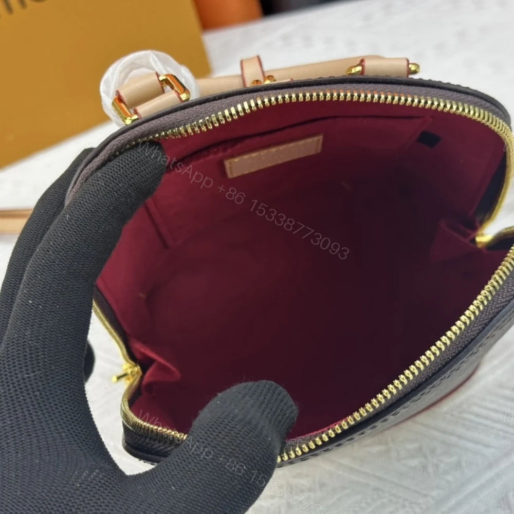 View 9 of Louis Vuitton Alma Backpack Monogram Canvas Brown 20Cm M47132