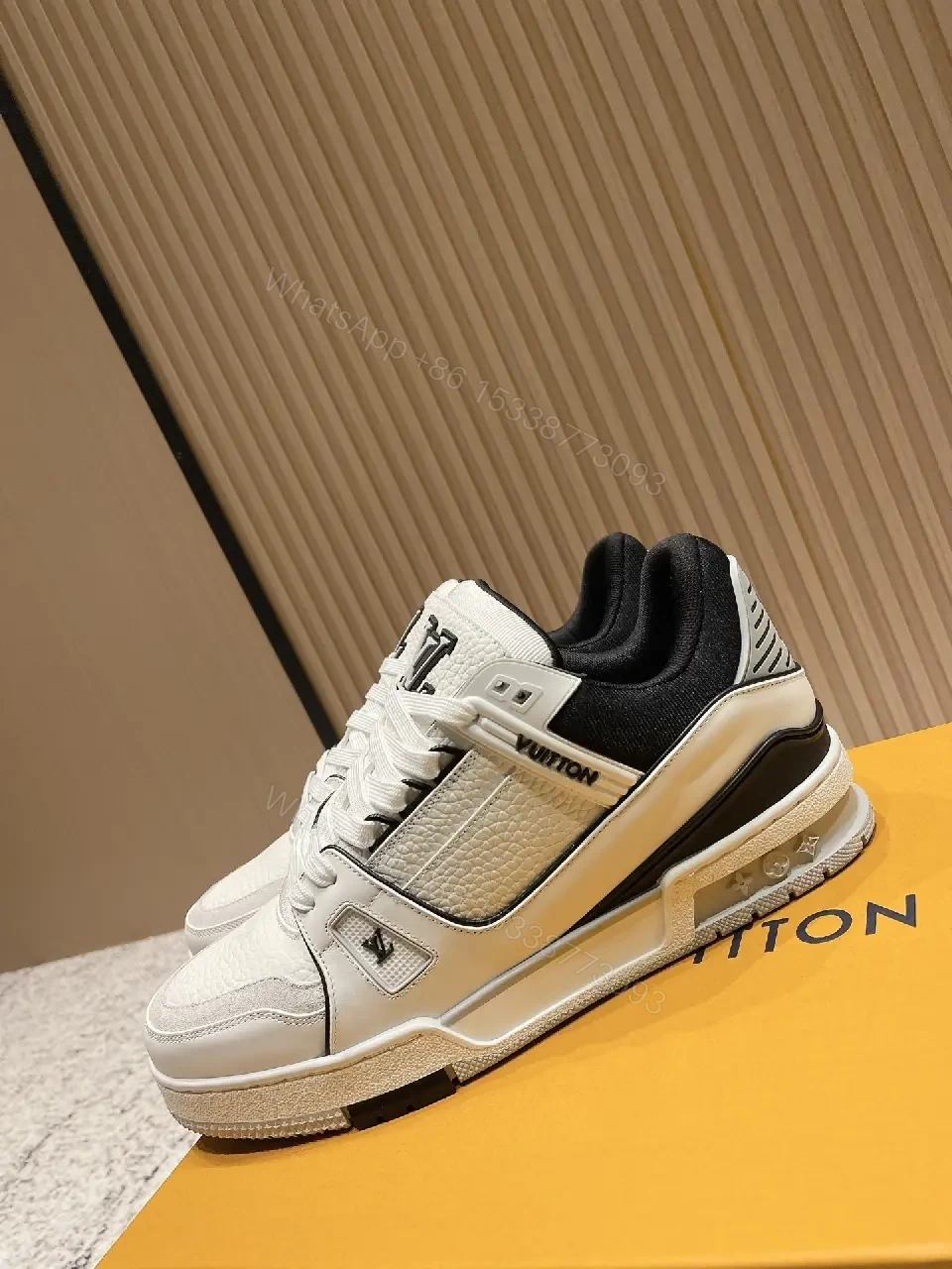 View 3 of White Leather Runner Sneakers with LV Detailing
