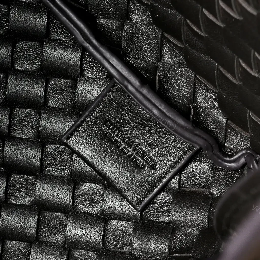 View 4 of brown woven leather hobo bag with intrecciato texture for everyday luxury