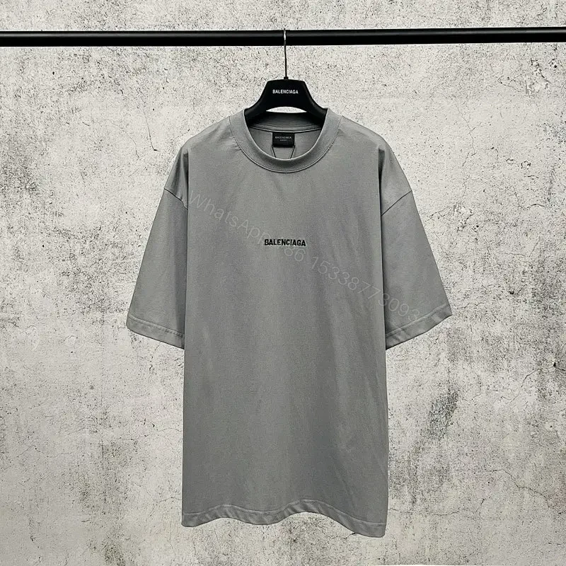 Neutral Cotton Oversized Tee: Minimal Logo, Elevated Comfort — view 1