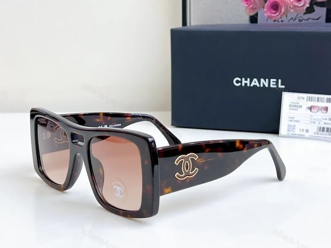 Bold Tortoise Acetate Oversized Sunglasses with Gold Logo Details — view 1