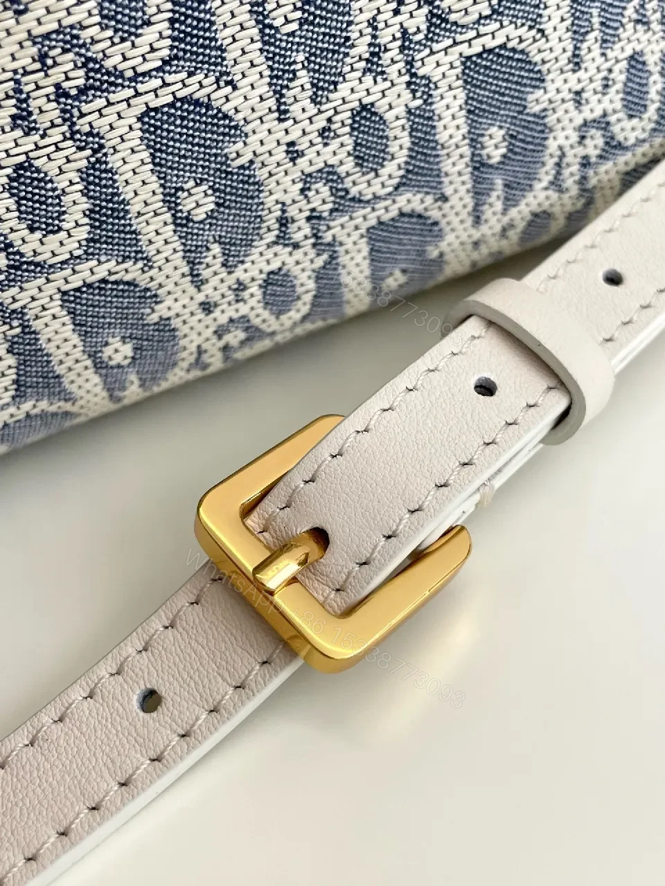 View 5 of Denim-Texture Mini Bag with White Leather Strap Signature Chic Luxury