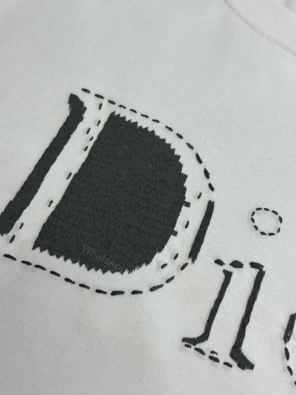View 10 of Minimalist White Logo Tee - Premium Cotton, Modern Fit, Graphic Accent