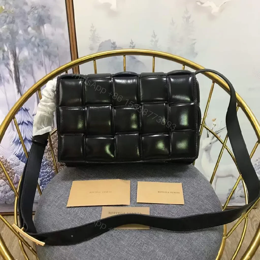 View 4 of Black Leather Grid Bag: Structured Chic Crossbody with Gold Triangle Hardware