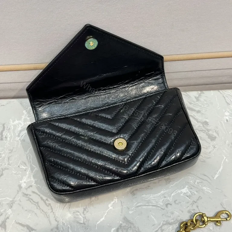 View 8 of Structured Quilted Leather Handbag with YSL Crest