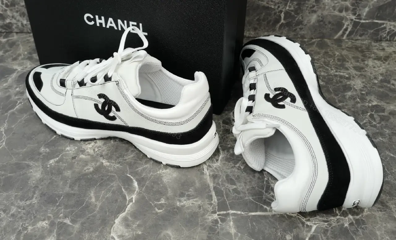 View 10 of White Leather Chunky Sneaker with Chanel Logo Details