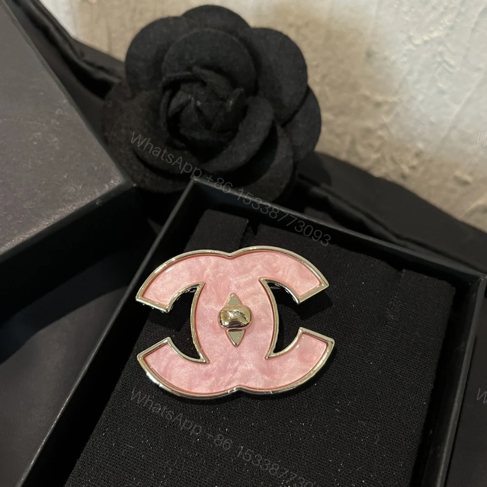 View 2 of Chanel Cc Logo Brooch In Pink Enamel With Gold Tone Hardware