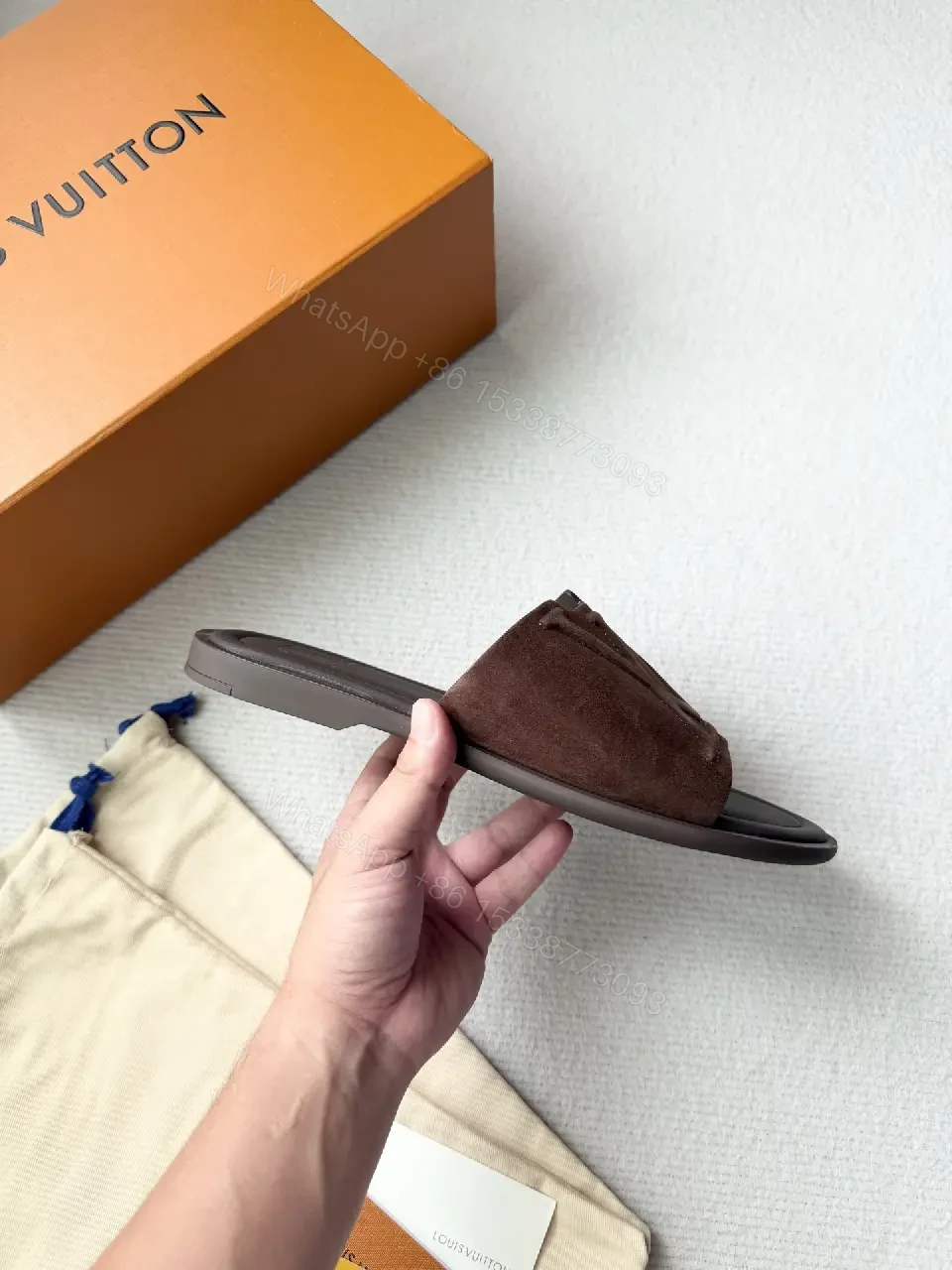 View 9 of Textured Suede Slide with LV Detailing