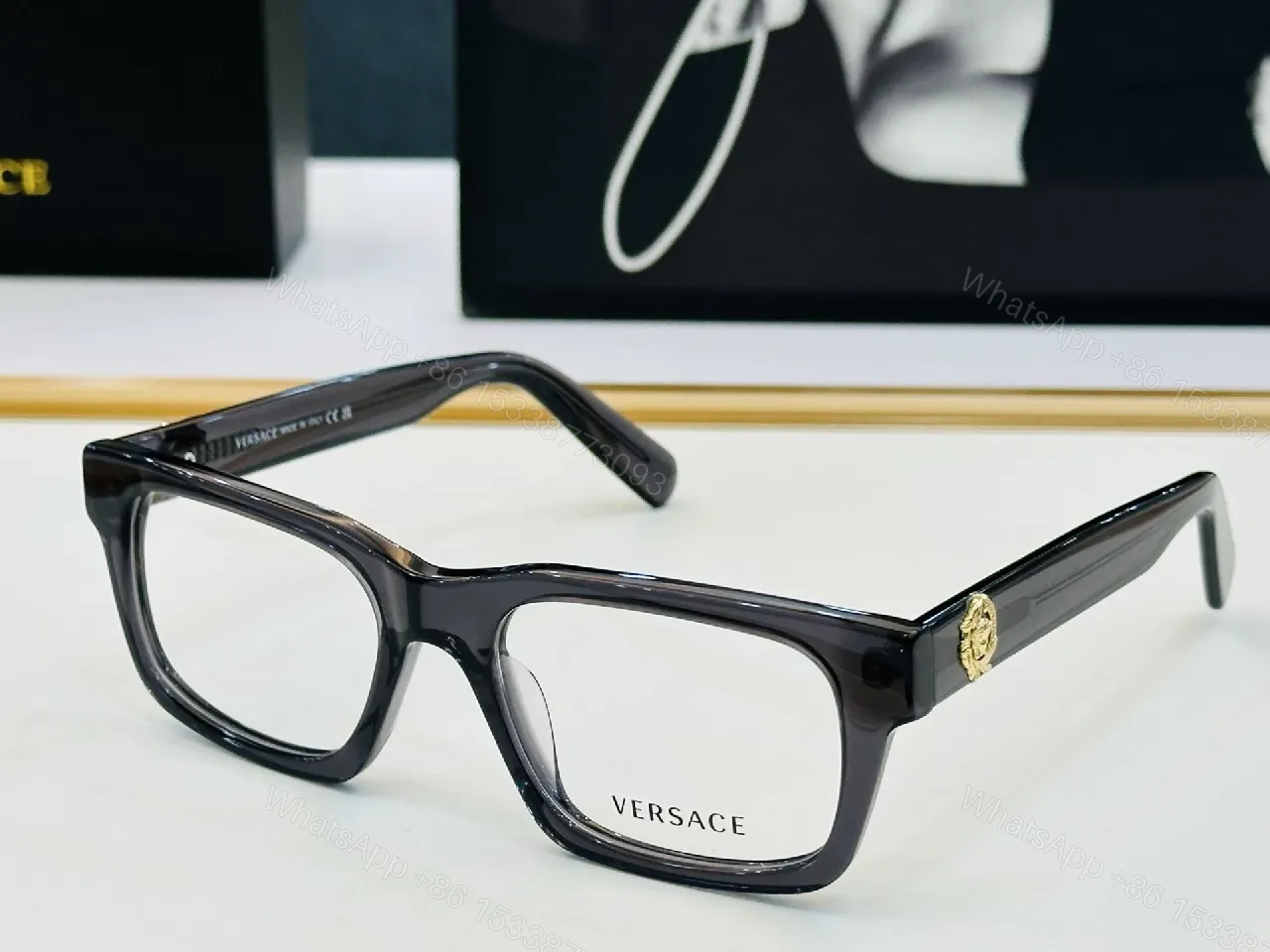 View 3 of Elegant Black Acetate Frames – Gold Medusa Detail, Rectangular