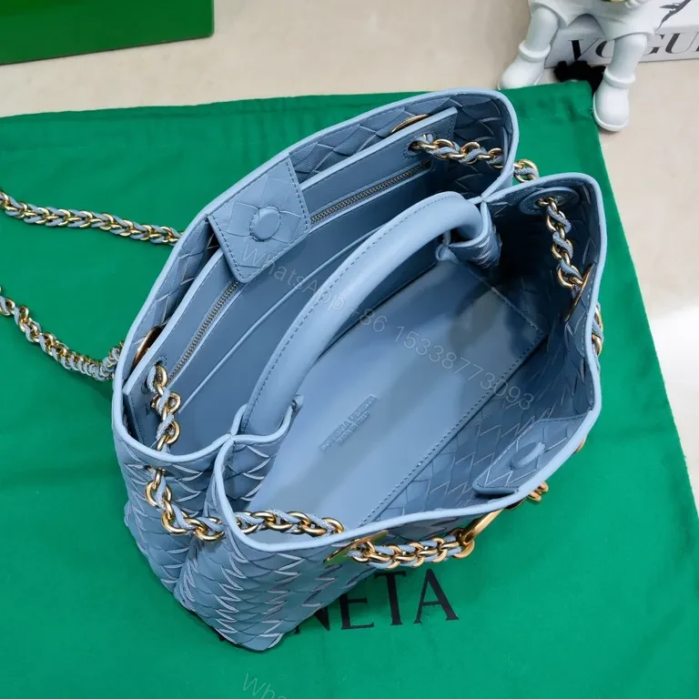 View 3 of Blue Woven Handbag: Premium Vegan Textile, Gold Hardware, Structured Silhouette