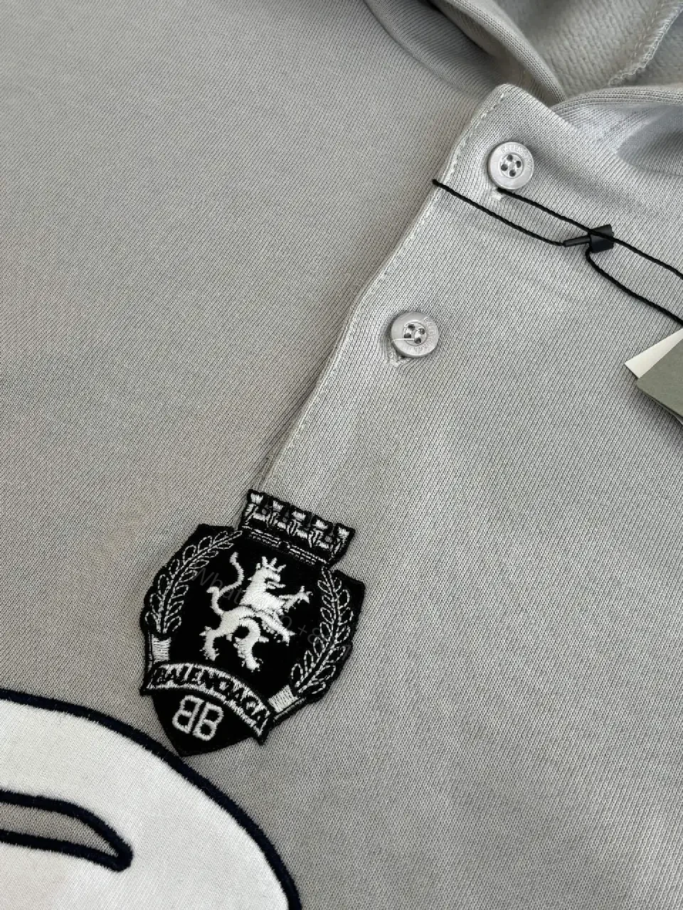 View 3 of Soft-Edge Comfort Hoodie: Graphic Branding, Oversized Streetwear