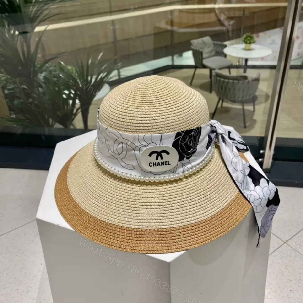 Chic Wide-Brim Straw Hat with Pearl Band Detail — view 1