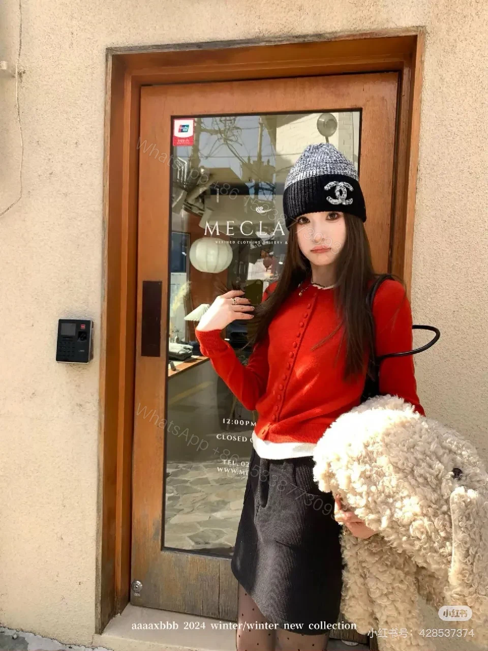 View 6 of Bold Knit Beanie with Logo Hardware - Luxury Casual Style