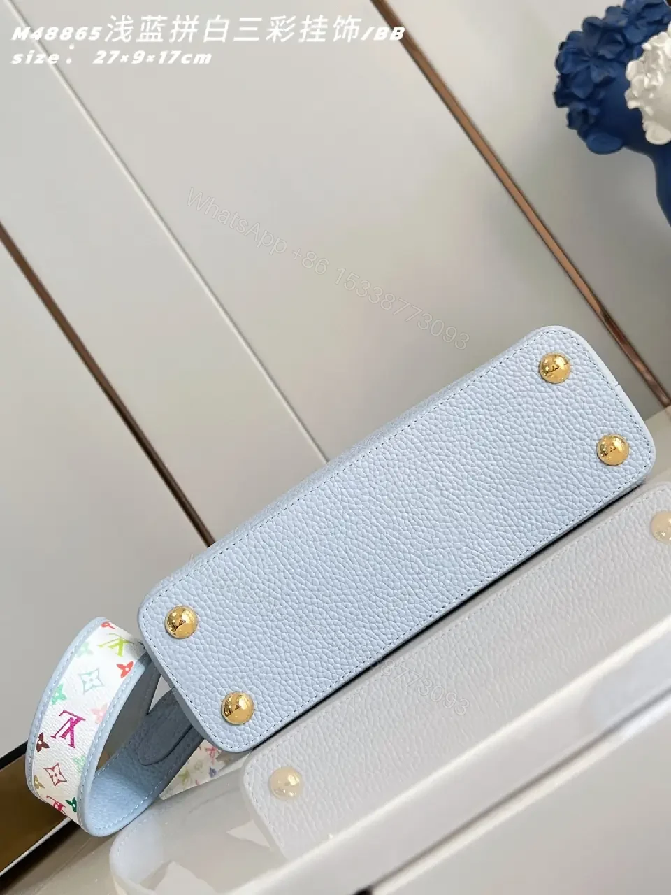 View 6 of Light Blue Leather Handbag with Gold Hardware Details