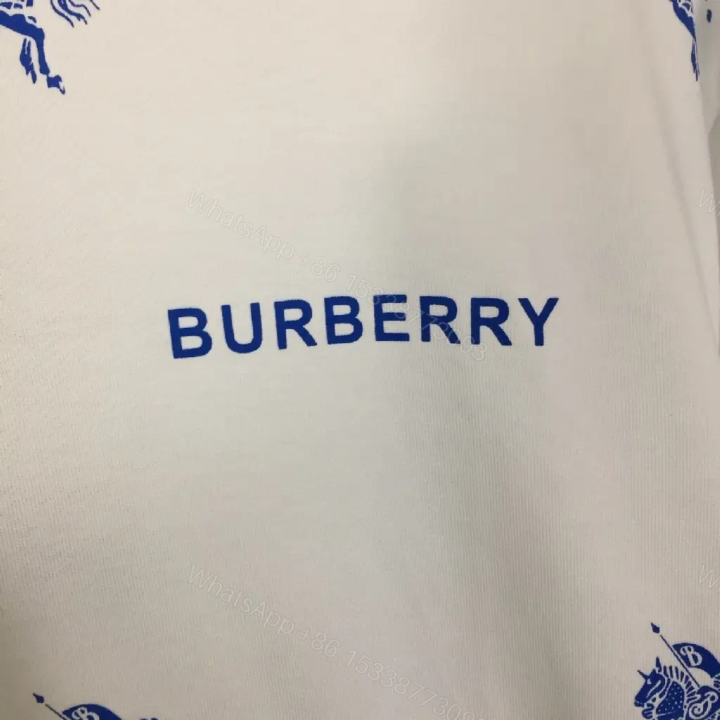 View 2 of White Burberry-Print Tee with Blue Motifs