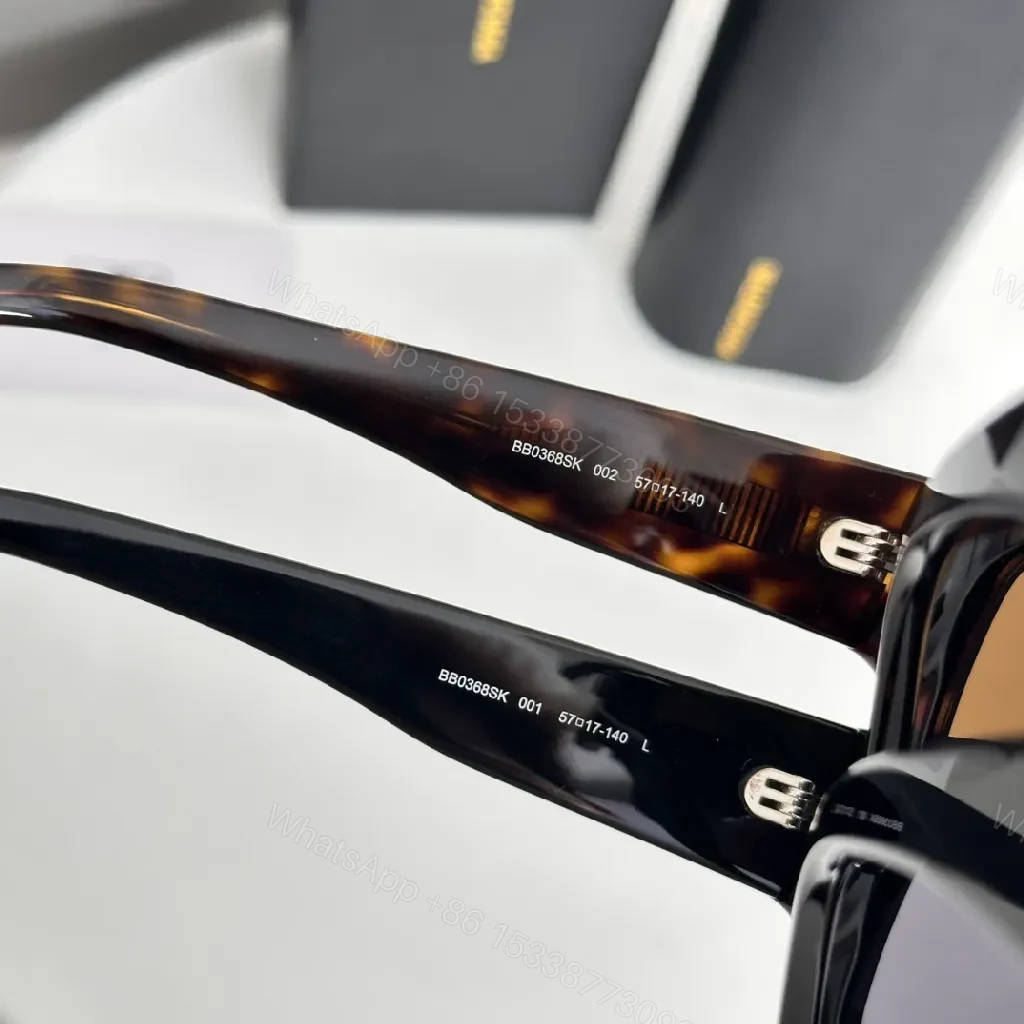 View 6 of Minimalist Black Acetate Sunglasses with Bold Presence