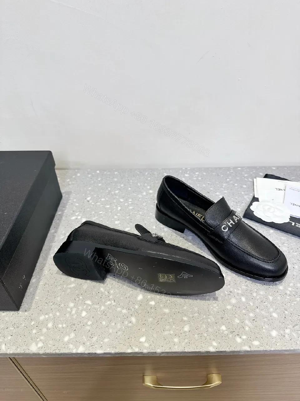 View 8 of Black Leather Slip-On with Logo Strap – Modern Luxe Comfort