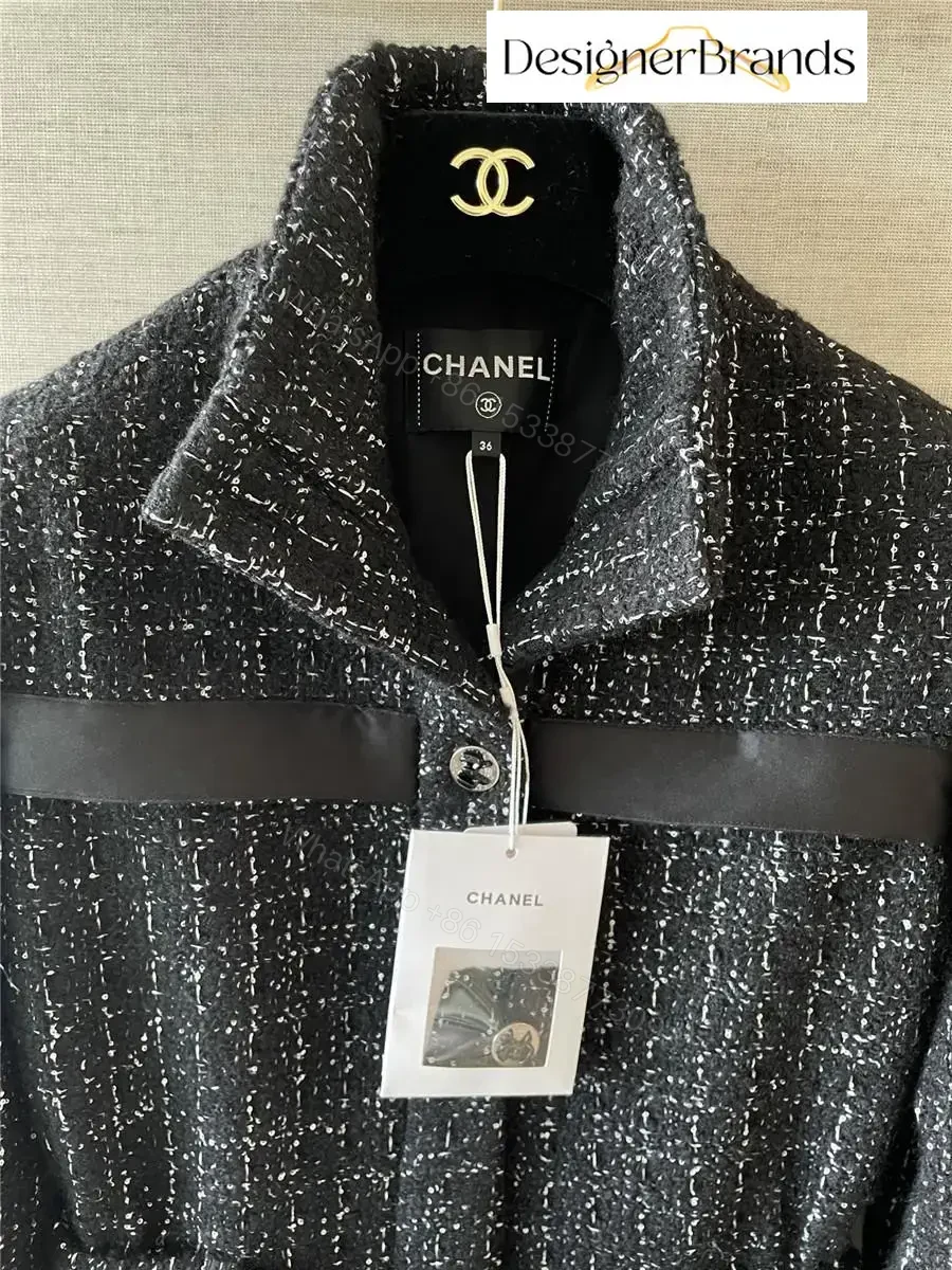 View 2 of Textured Tweed Belted Jacket with Metallic Accents