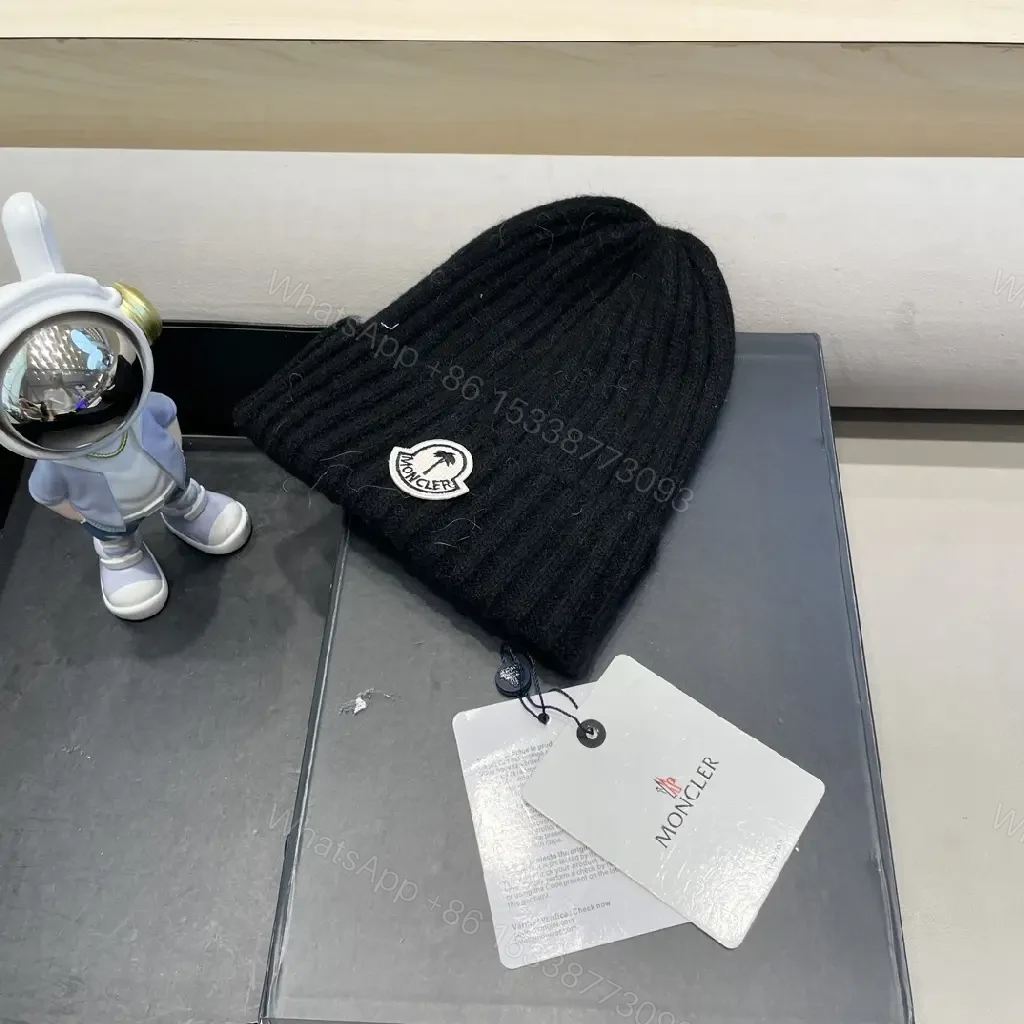 View 7 of Cozy Black Knit Beanie with Signature Patch, Luxury Style