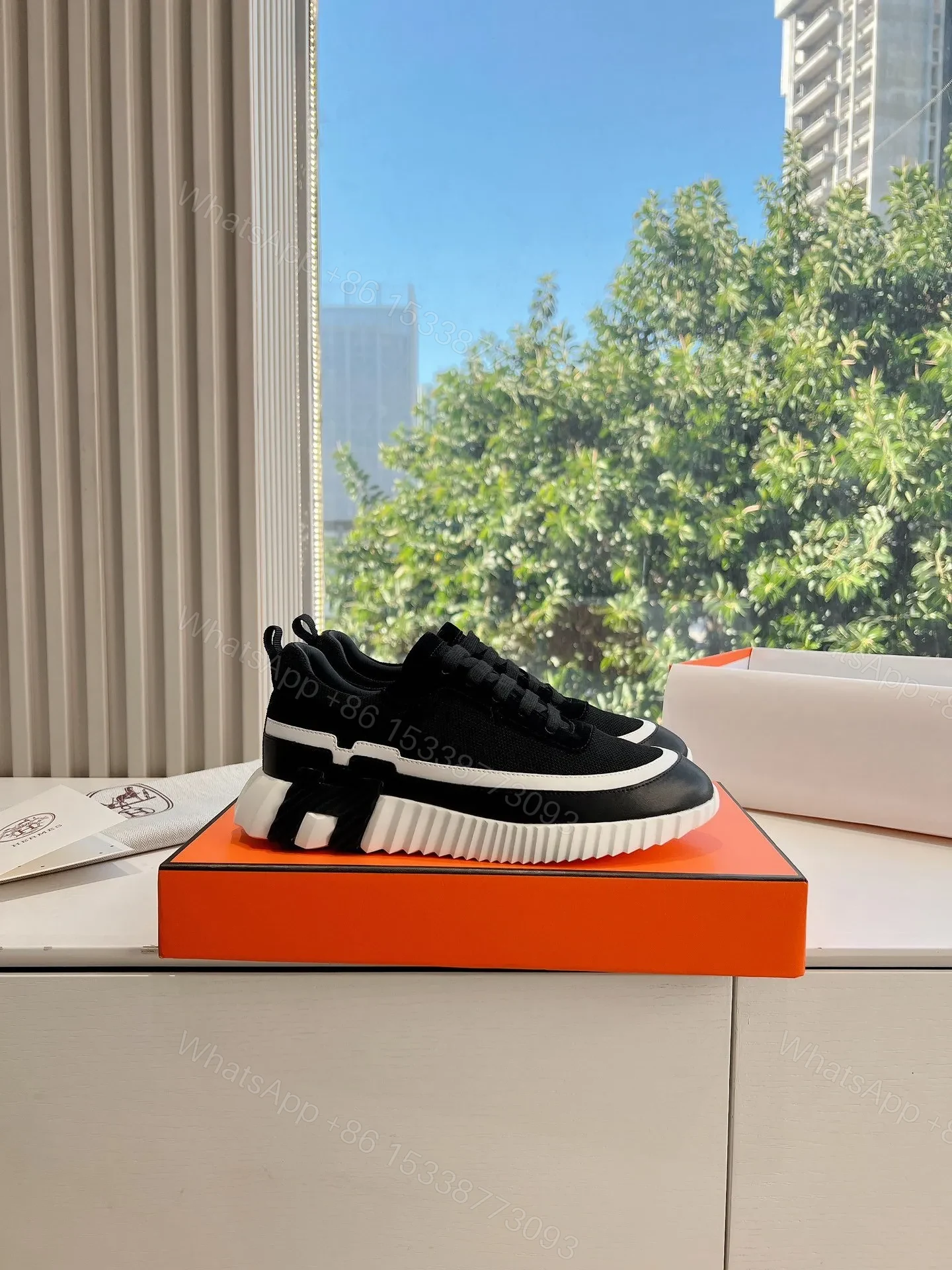 View 2 of Hermes Women Black Mesh And Leather Sneakers