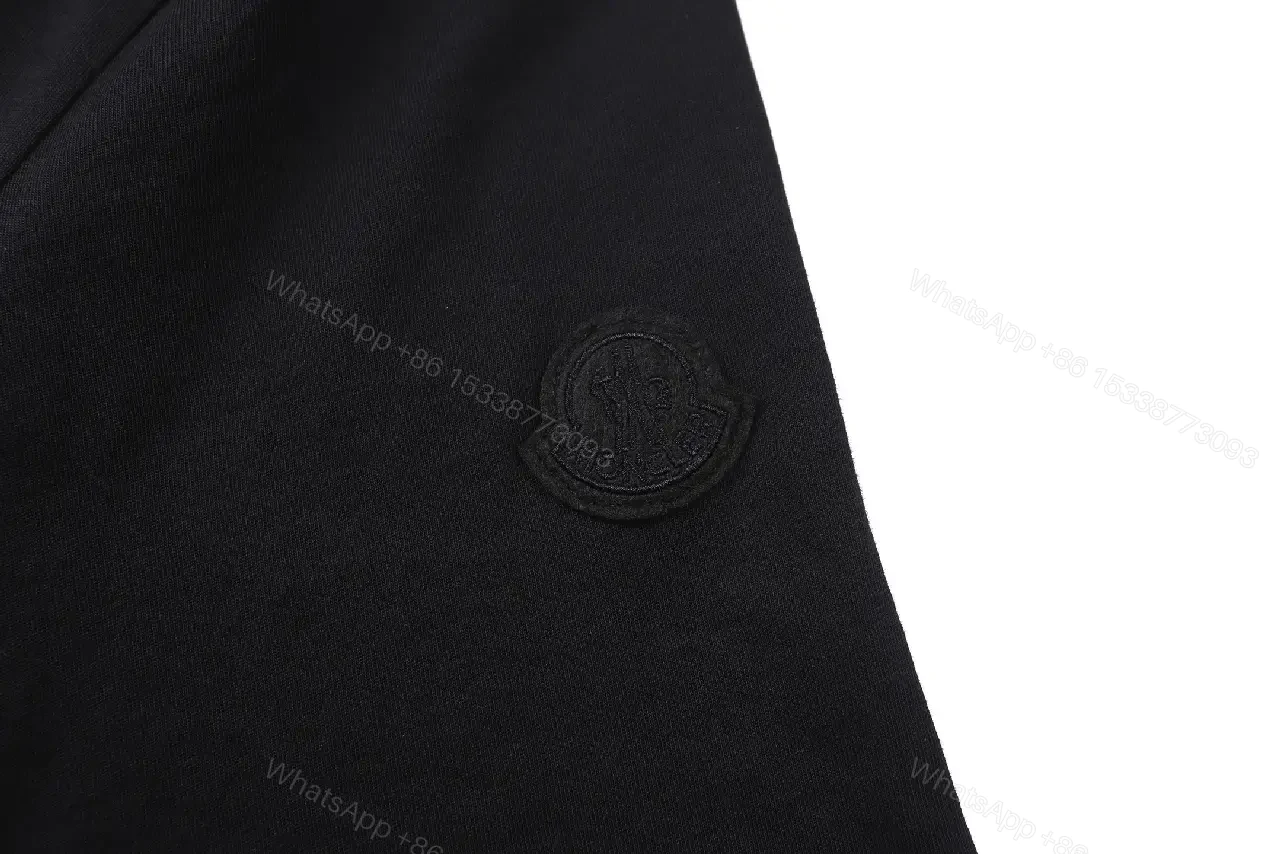 View 6 of Minimalist Cotton Crest Tee - Black Luxe Tee