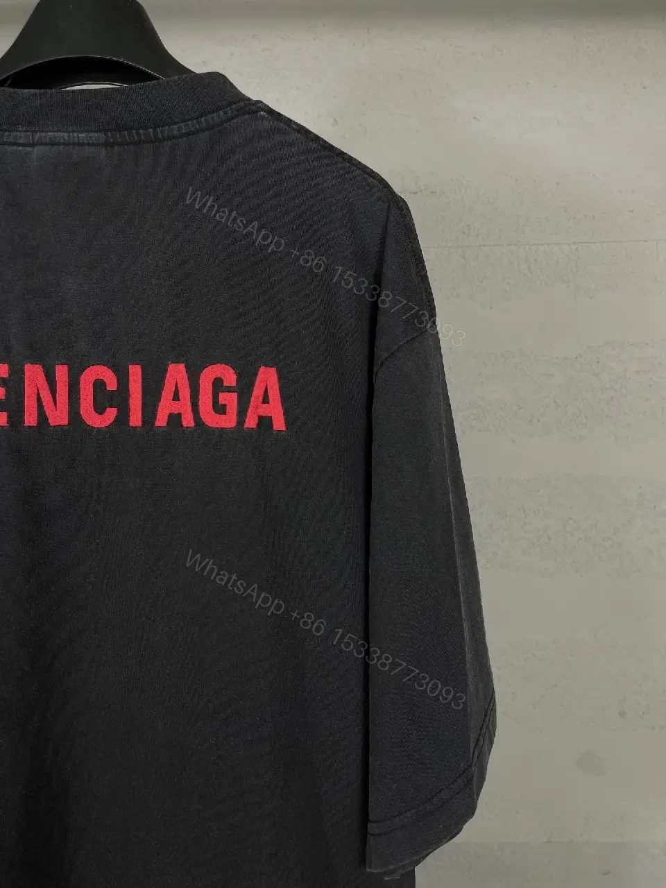 View 10 of Oversized Black Tee Dress with Subtle Red Logo, Modern Couture Edge