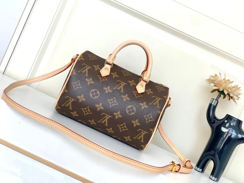 View 9 of Louis Monogram Carry: City-Ready Leather-Trim Handbag