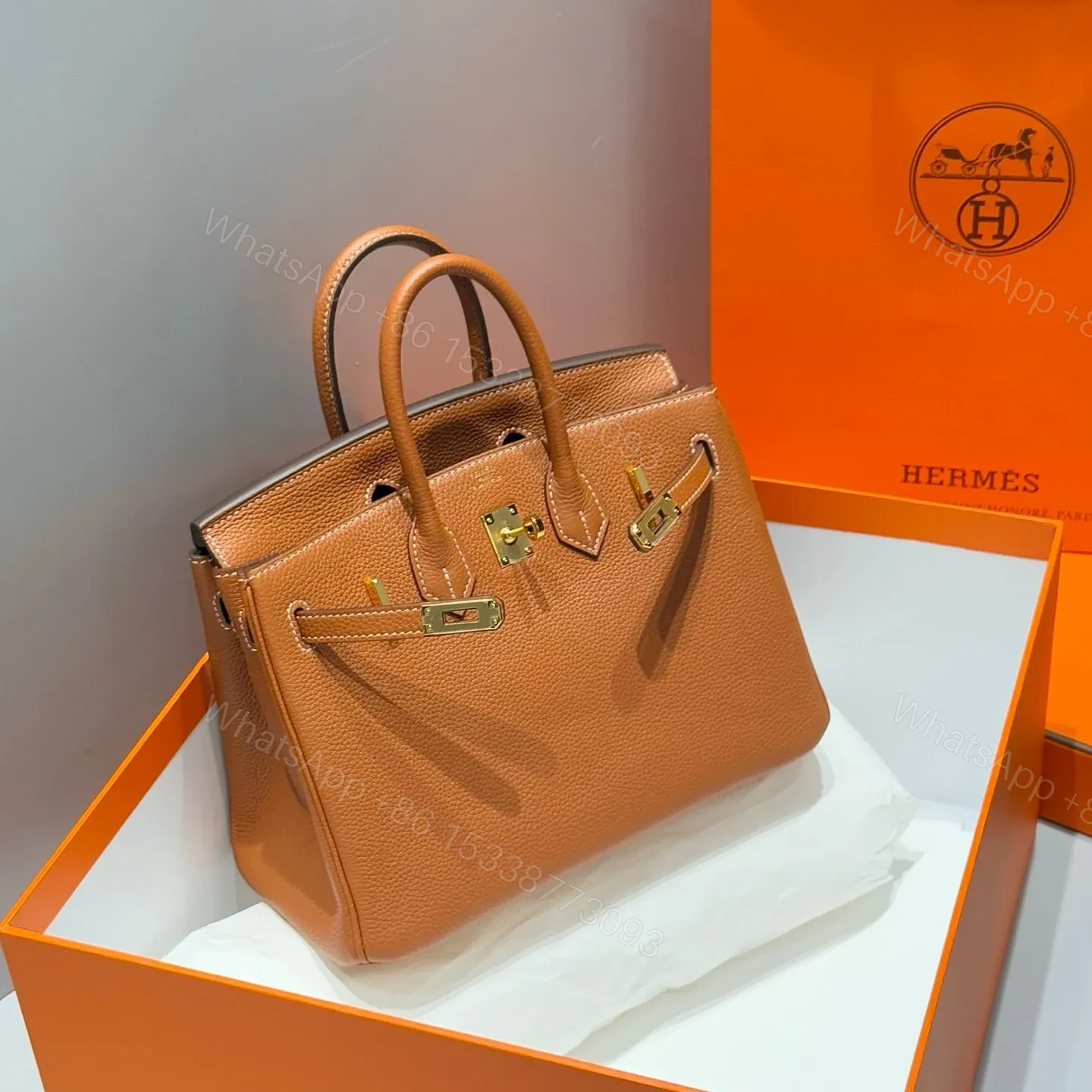 View 2 of HN 25 IN BURNT ORANGE CALFSKIN GOLD HARDWARE