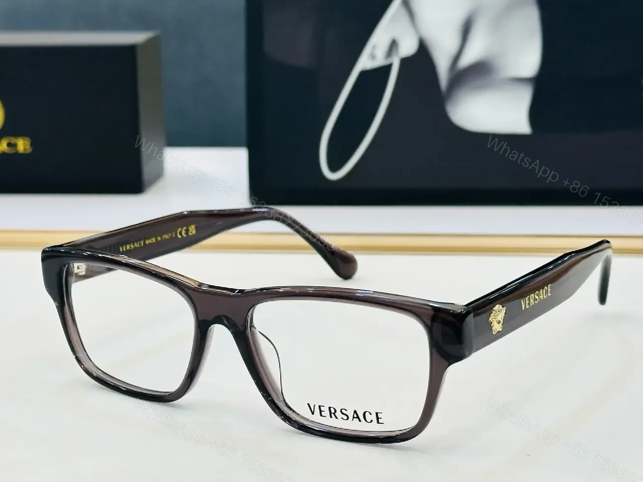 View 8 of Bold Black Acetate Square Glasses with Gold Logo Emblems