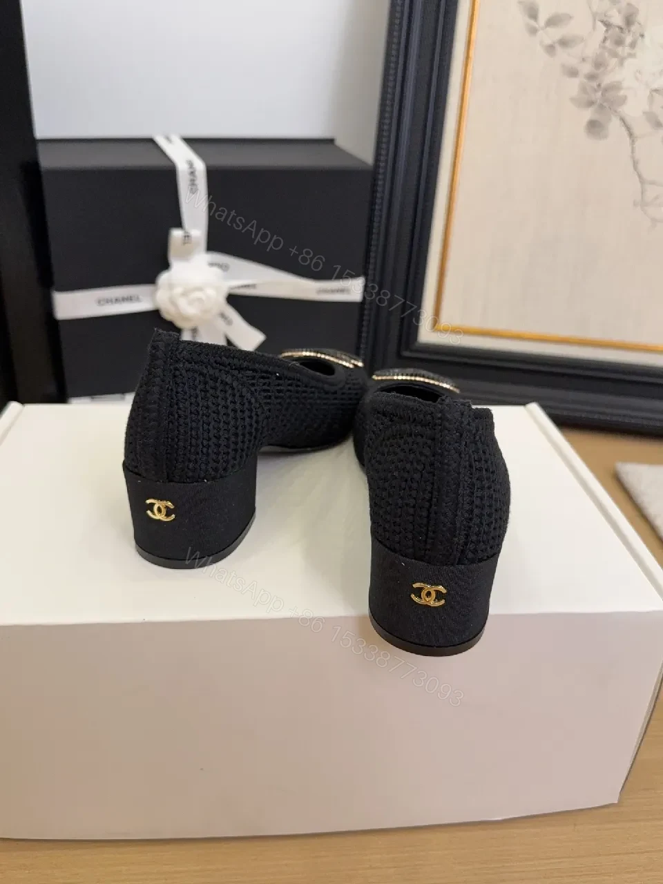 View 7 of Elegant Quilted Black Loafers with Gold Emblem: Everyday Luxury