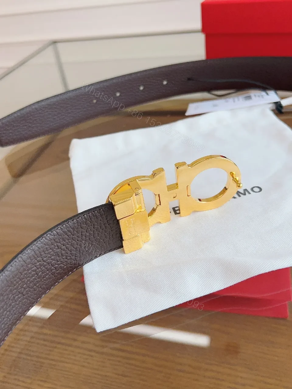 View 2 of Black Leather Belt with Gold Gancini Clasp, Luxe Classic Style, Adjustable