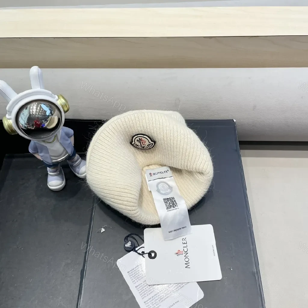 View 8 of Cozy Crest Beanie in Ivory Knit with Subtle Logo Patch