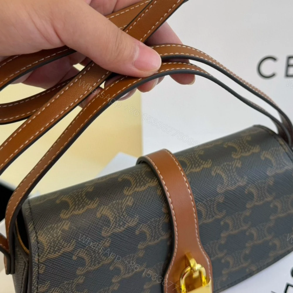 View 6 of CELINE CLUTCH ON STRAP TABOU IN TRIOMPHE CANVAS AND CALFSKIN TAN 20CM 10I592DQ2 04LU