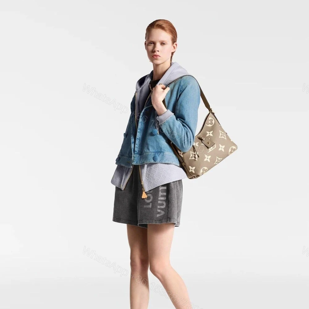 View 10 of Louis Vuitton Carryall PM Bicolor Monogram Empreinte Dove And Cream 29Cm M47180