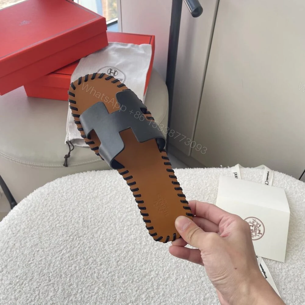 View 3 of Hermes Oran Sandals Stitching In Black And Brown