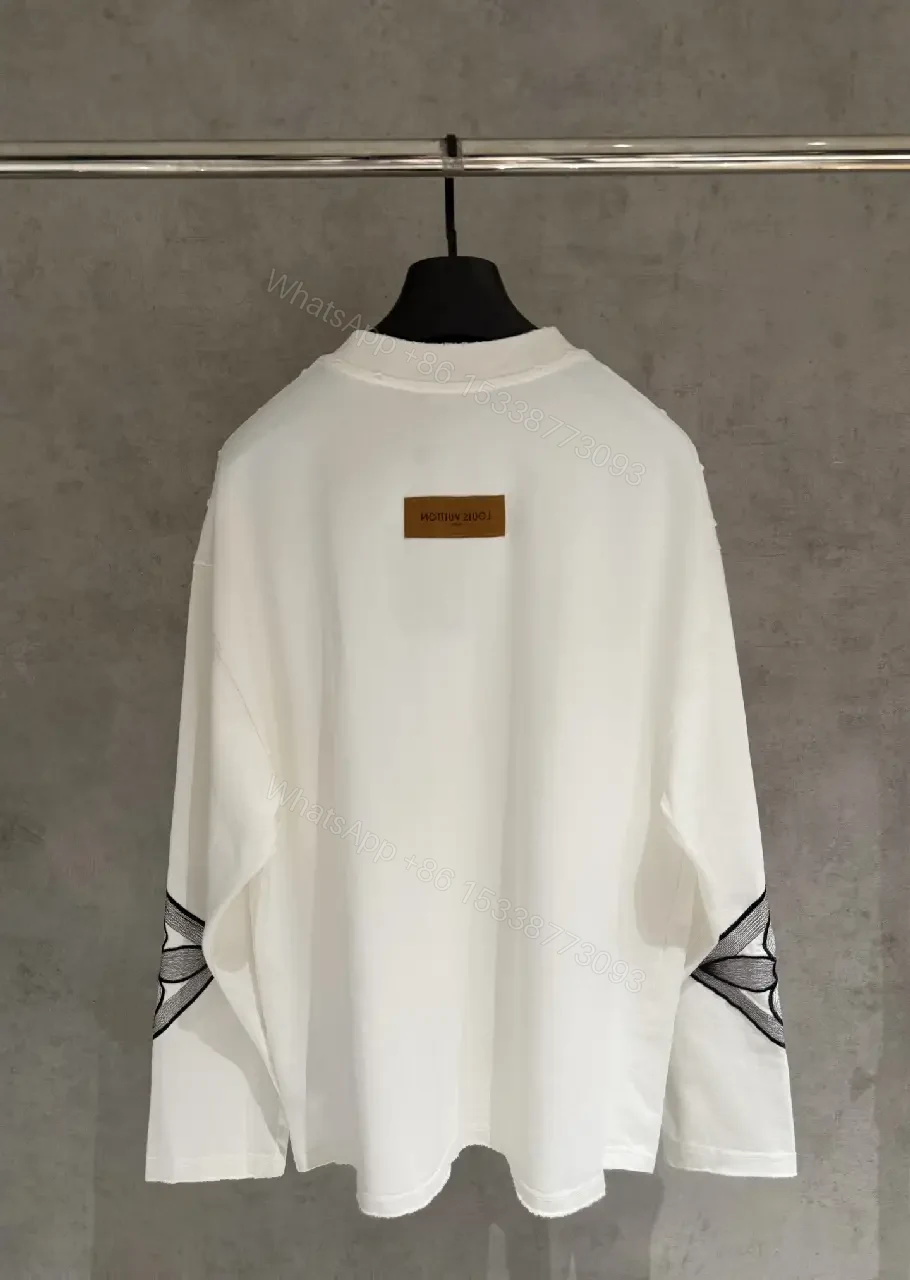 View 7 of White Cotton-Blend Pullover with LV Logo & Architectural Sleeves