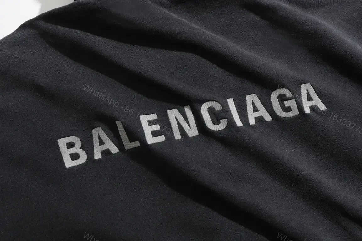 View 5 of Black Zip Hoodie Jacket: Minimalist, All-Season Layering, Durable