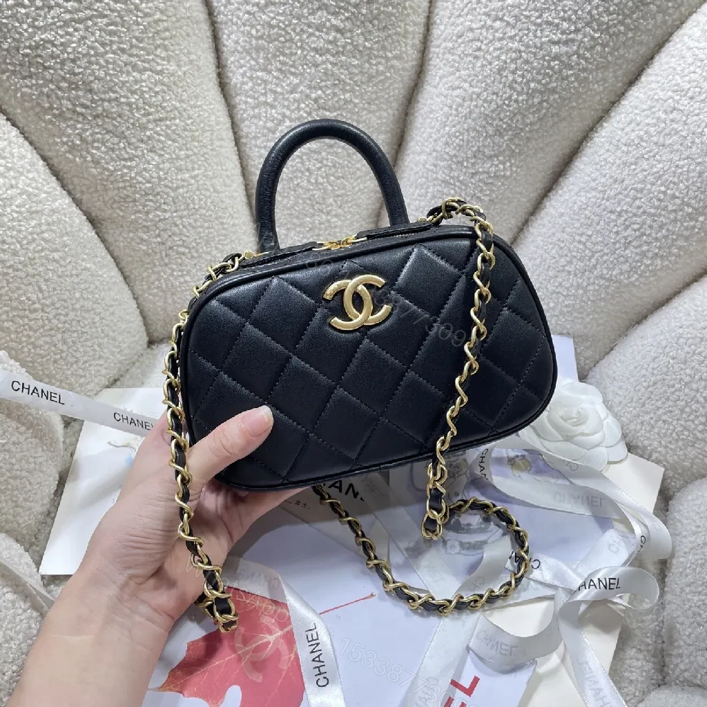 View 8 of Compact Black Quilted Handbag with Gold Logo Chain