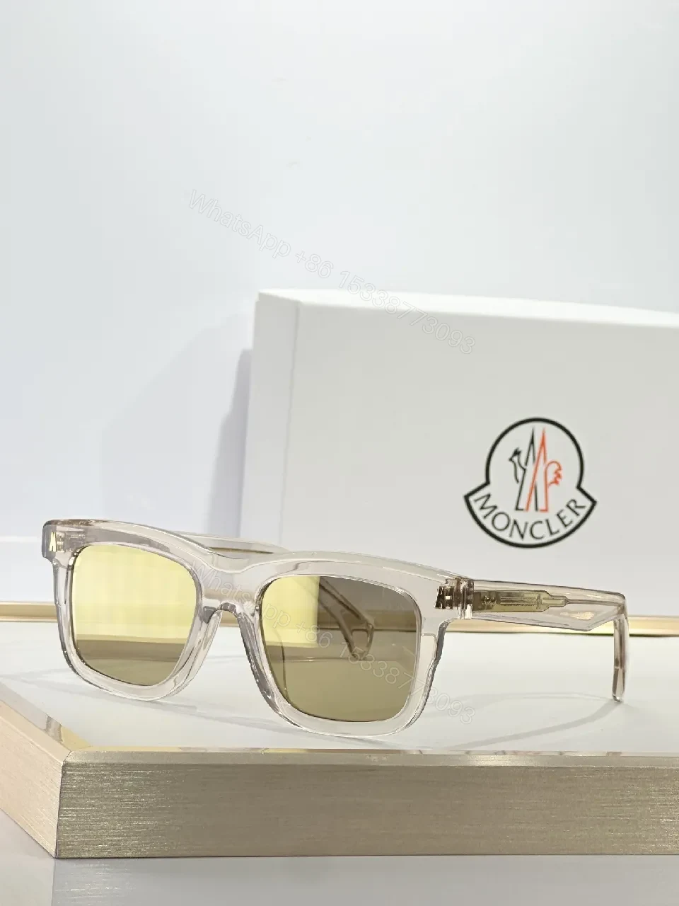 Translucent Frame Sunglasses with Amber Lenses and Gold Accents — view 1