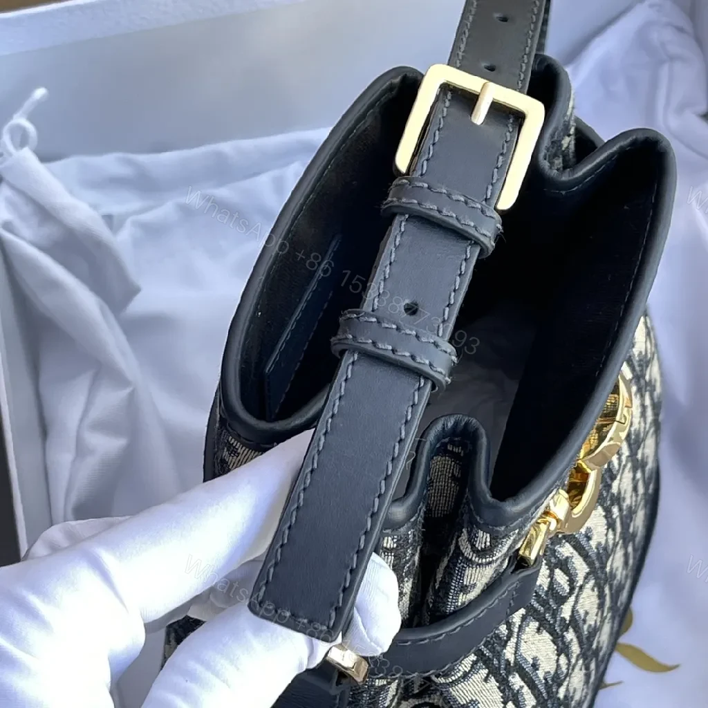 View 4 of Structured Classic Monogram Canvas Bucket Bag with Gold Hardware