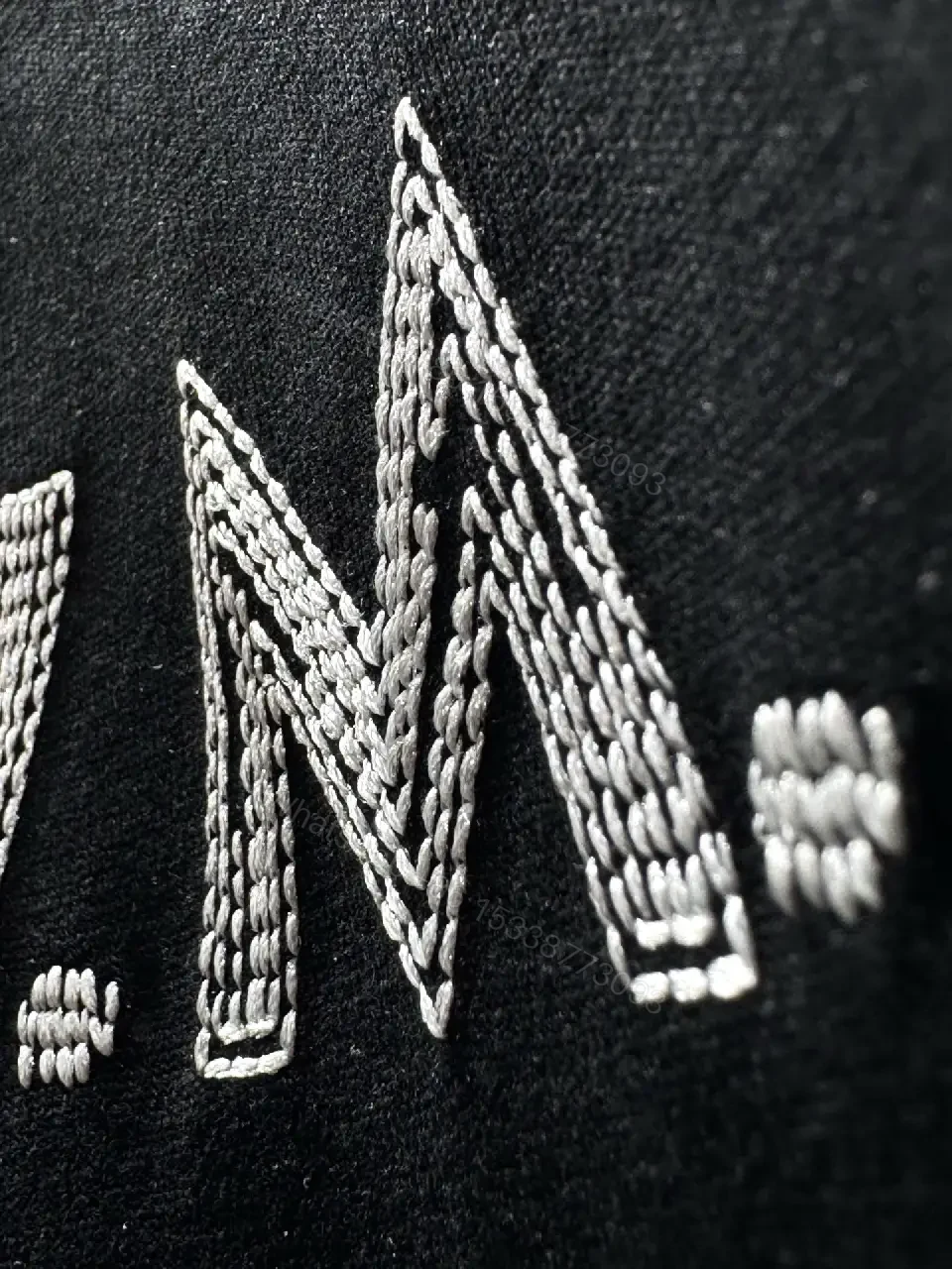 View 5 of Minimalist Black Cotton Tee with Subtle LV.M Logo