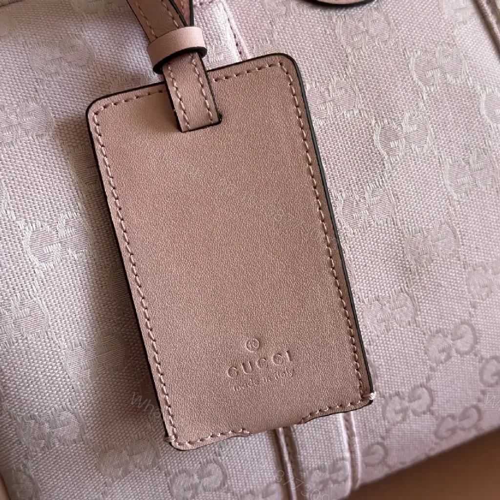 View 3 of Soft Pink Jacquard Satchel: Subtle Pattern, Bold Presence