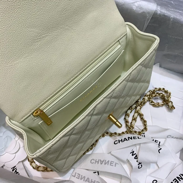 View 8 of Compact Quilted Handbag with Gold Chain Strap - Timeless Luxury