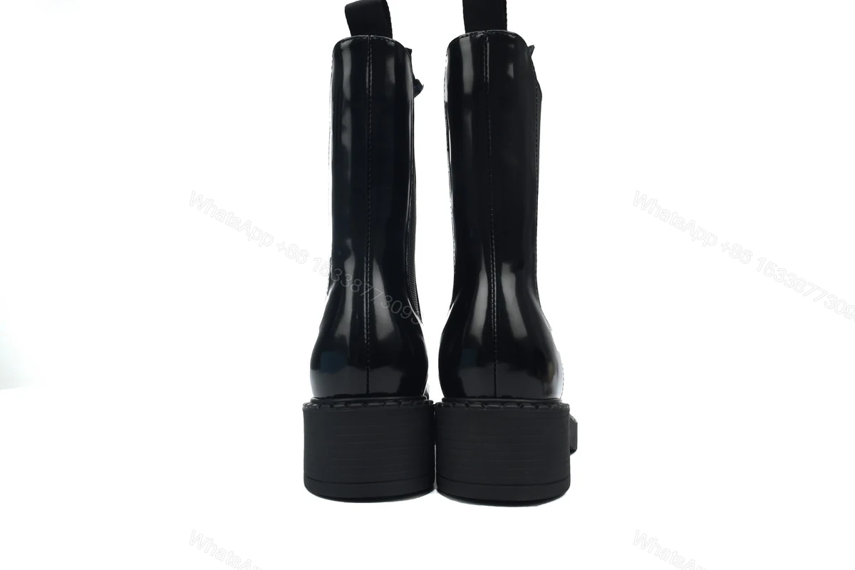 View 3 of Prada Monolith patent leather booties black