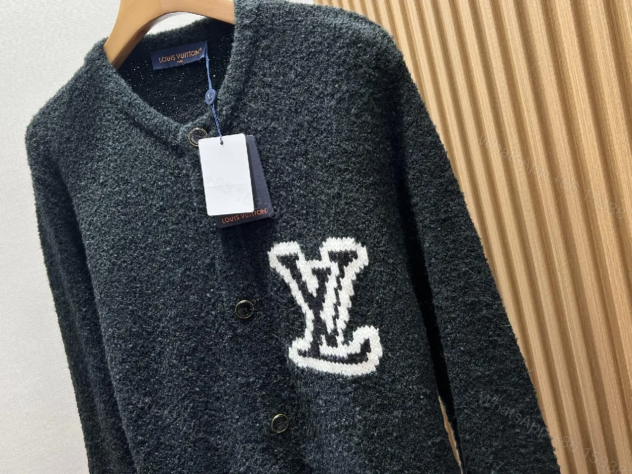 View 6 of Black Boucle Cardigan | Luxe Texture + Signature Logo + Cozy Warmth